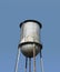 Top of an old fashioned water tower isolated