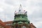 Top of old tenement house with Polish flags and european union flags