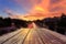 Top of old wooden table and sunset blur background