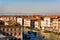 Top panoramic amazing view on Grand chanel in Venice, Italy. Many gondolas sailing down one of the canals. Sunny day in Venice.