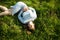 Top picture of a young girl lying in the green grass. Relax.