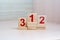 Top places. First place. Wooden blocks with numbers.