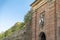 Top of Porta Santa Maria St Mary Gate with a limestone panther holding the coat of arms of the municipality, Lucca, Tuscany,