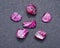 Top quality A grade small rough RUBY crystals from Tanzania on black. RED CORUNDUM.