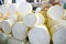 Top quality Peruvian organic cheeses in a market stall in the city of Cusco, Peru.