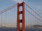 Top of Red Art Deco Tower and supporting cables on the Golden Gate Bridge