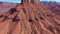 Top Red Rock Butte Formation In Colorado River Valley Aerial Shot Bottom Up