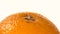 Top of ripe orange isolated on white, rotation