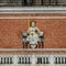 Top sculpture of Justice at Campanile bell tower at San Marco square in Venice, Italy, closeup, details