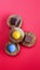 Top shot of gourmet chocolate pieces on round pieces of wood