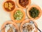 Top shot of of rice and dishes on a table. Economy mixed rice with vegetables and meat is popular in Singapore and Malaysia,