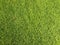 Top veiw, Abstract blurred artificult turf green seamless texture for design, grass feild background, stadium floor