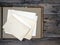 Top veiw of clear retro blank photo frames to placed your pictures or text on album on wooden board background in retro