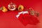 Top view accessories Chinese new year festival decorations of tangerines leaf red packet and dollar money