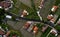 Top view or aerial shot of fresh green and yellow rice fields. Aerial view of Planted Rice fields and rural villages, geometry of