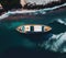 Top view aerial shot of yacht at ocean coastline, generative ai