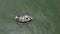Top view, aerial view wooden fishing boat on the beach from a drone.