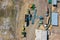 Top view on agricultural machinery near the hangar in the village for planting and harvesting. Tractor, plow, combine fuel truck