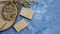 Top view, Aleppo soap and dray Laurus nobilis flower in a wooden plate