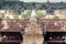 Top view on alley with tourists near historical landscape of Angkor What temple, 12th century Khmer landmark