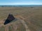 Top view of Ames Monument in the middle of the field under blue sky near Laramie and Bosler Wyoming