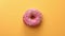 Top view appetizing fresh sweet doughnut with bright glazed sprinkle rotating isolated on yellow