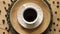 Top view of aromatic black coffee on decorative plate on wooden table