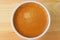 Top view of aromatic Espresso coffee in white coffee cup on wooden table