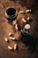 top view of arranged peanuts bottle and glass of beer