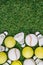 top view of arrangement of badminton shuttlecocks tennis and baseball balls