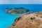 Top view of Assos village located in cute bay on beautiful blue sea coastline, Kefalonia island, Greece