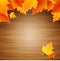 Top view autumn leaves on the wood board. concept autumn season.