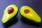 Top view of an avocado  half with seed inside. Blurred photo bokeh