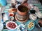 Top view, background of various dishes, Isaan food, clay pot concept.