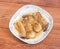 Top view of baked Eringi mushrooms on dish closeup