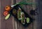 Top view of baked tortillas with black beans, tomato, cilantro, red onion, avocado and assorted spices served with avocado dip