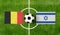 Top view ball with Belgium vs. Israel flags match on green football field