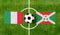 Top view ball with Italy vs. Burundi flags match on green football field