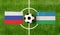 Top view ball with Russia vs. Uzbekistan flags match on green soccer field