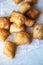 Top view of Baursak, Kazakh traditional baking, pieces of dough deep fried in oil