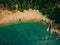 Top View of Beach. Aerial view of sandy beach with tourists swim