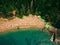 Top View of Beach. Aerial view of sandy beach with tourists swim