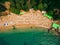 Top View of Beach. Aerial view of sandy beach with tourists swim