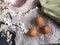 Top view of a beautiful breakfast with flowers and fresh pastries, muffins.Selective focus