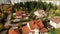 Top view of a beautiful cottage village in autumn