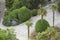 Top view of the beautiful landscaped grounds with palm trees of the tropical Park in the hotel