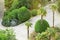 Top view of the beautiful landscaped grounds with palm trees of the tropical Park in the hotel