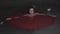 Top view of beautiful mysterious woman looking like a vampire wearing red dress standing in the pool.