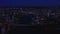 Top view of beautiful night city with modern lights. Stock footage. Landscape of night city with river and high-rises