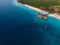 Top View on Beautiful thatch stilt house restaurant at Zanzibar Kendwa beach at evening time in Blue Water of Indian